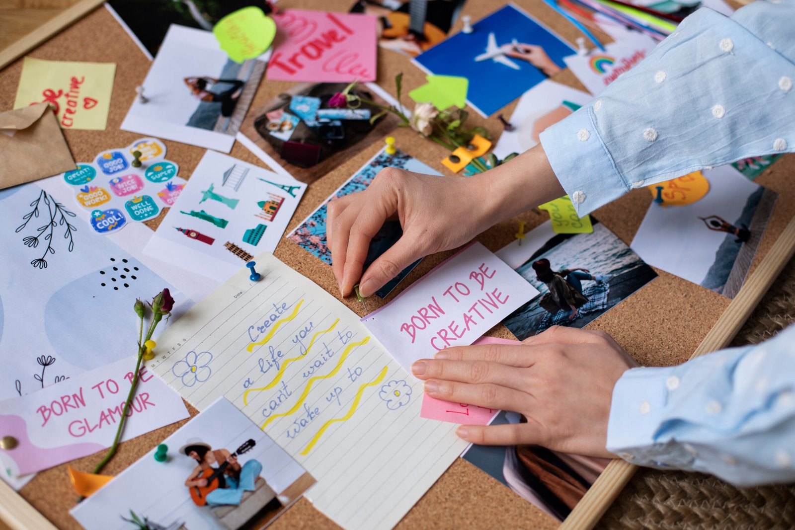 woman creating their own vision board
